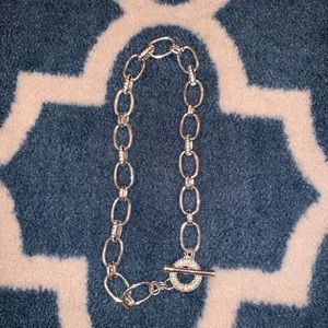 Silver tone chain necklace.